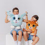 Two children enjoying a plush weighted leopard and puppy, each featuring large expressive eyes, 3D sensory cheeks, paws, and nose. These super-soft, cuddly sensory plushies are perfect for comfort, relaxation, and stress relief, showcased on a clean white background.