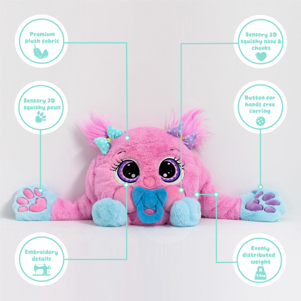 Pink plush weighted toy with blue accents on a light gray background, featuring text labels about its features.Sensory 3D squishy nose and Cheeks and Paws.