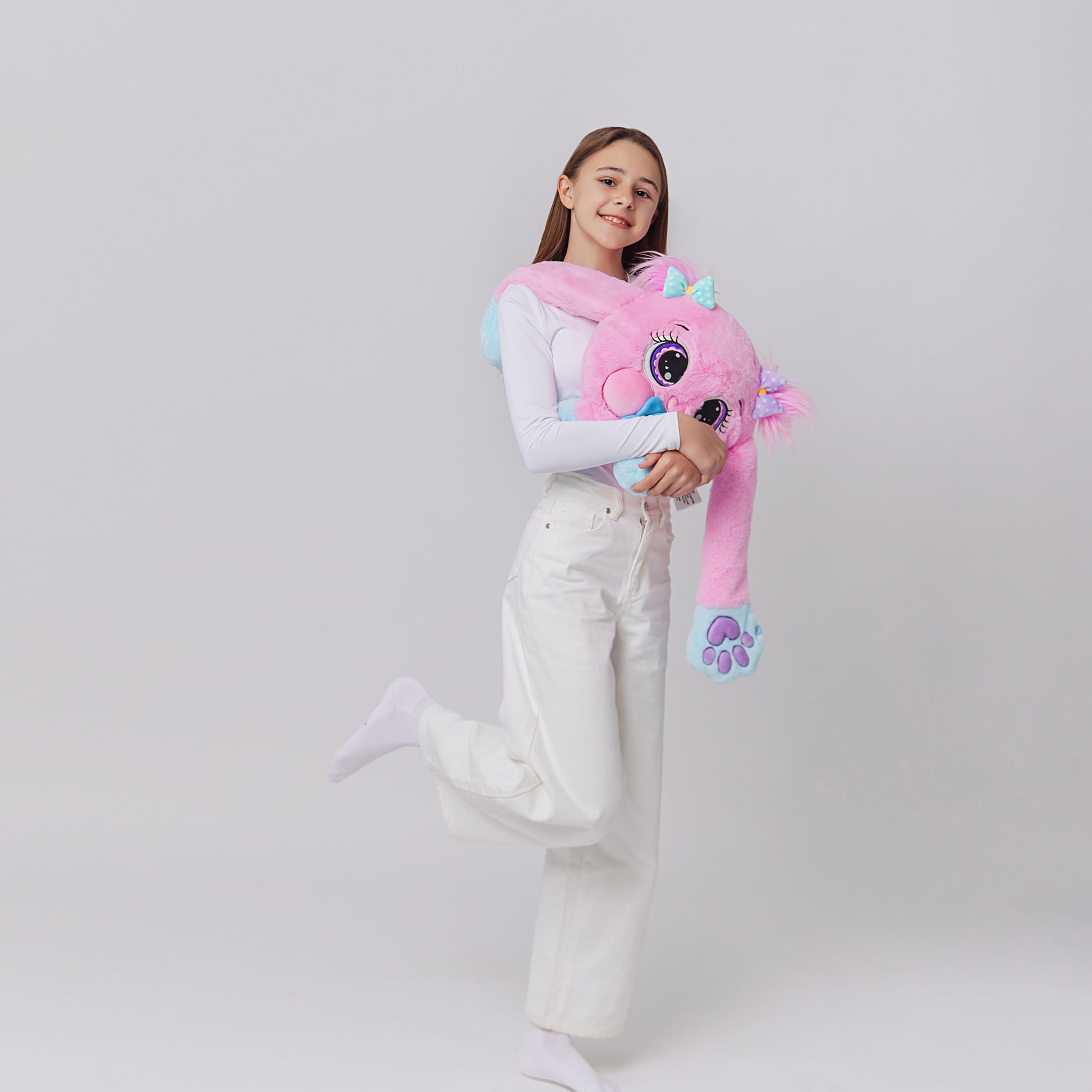 Purple plush weighted toy featuring 3D sensory cheeks, paws, and nose, with pink paws, blue accents, and large expressive eyes. This soft, cuddly sensory plush is perfect for relaxation, stress relief, and comfort, displayed on a clean white background.