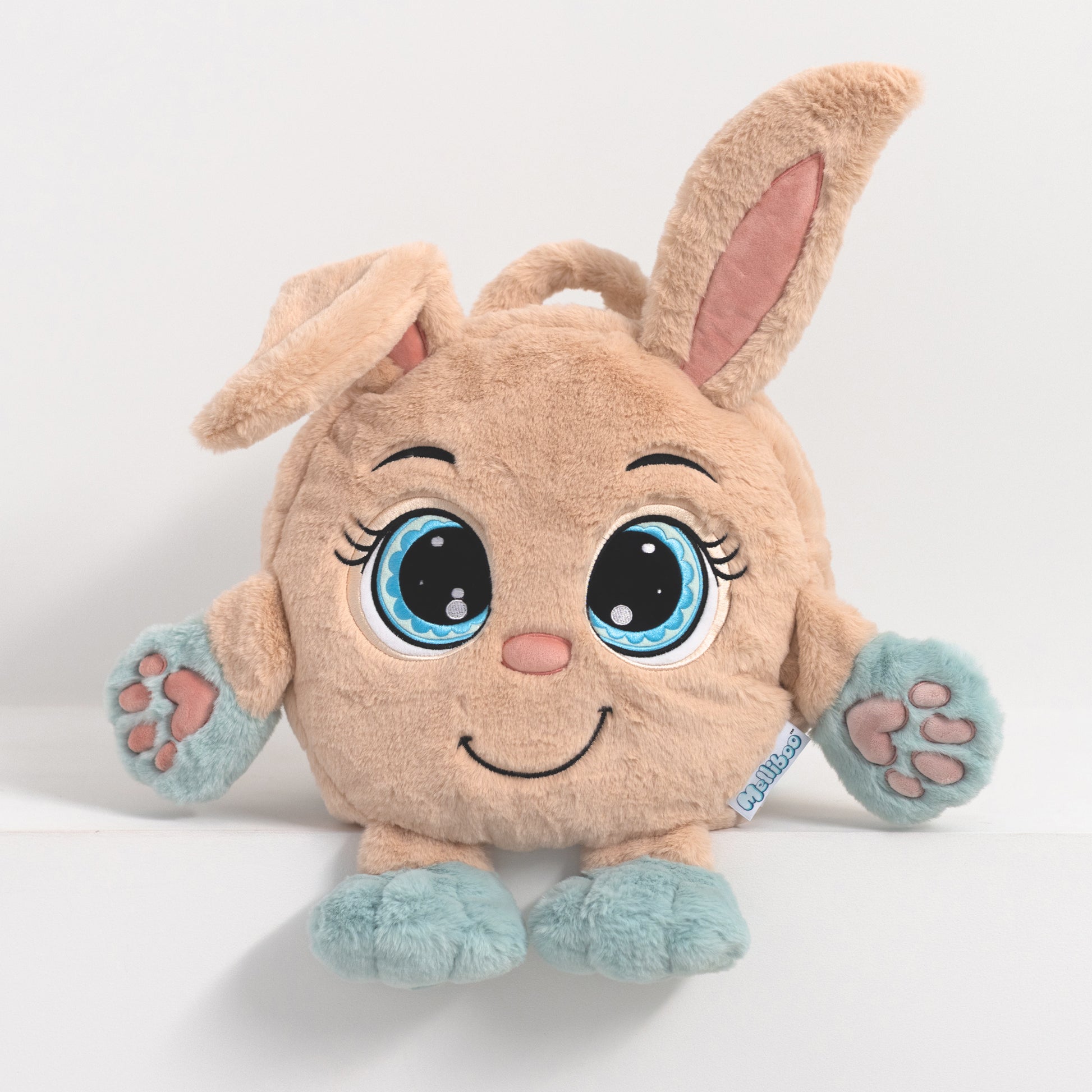 Adorable plush toy backpack with bunny ears and blue accents, perfect for kids, shown on a white background.