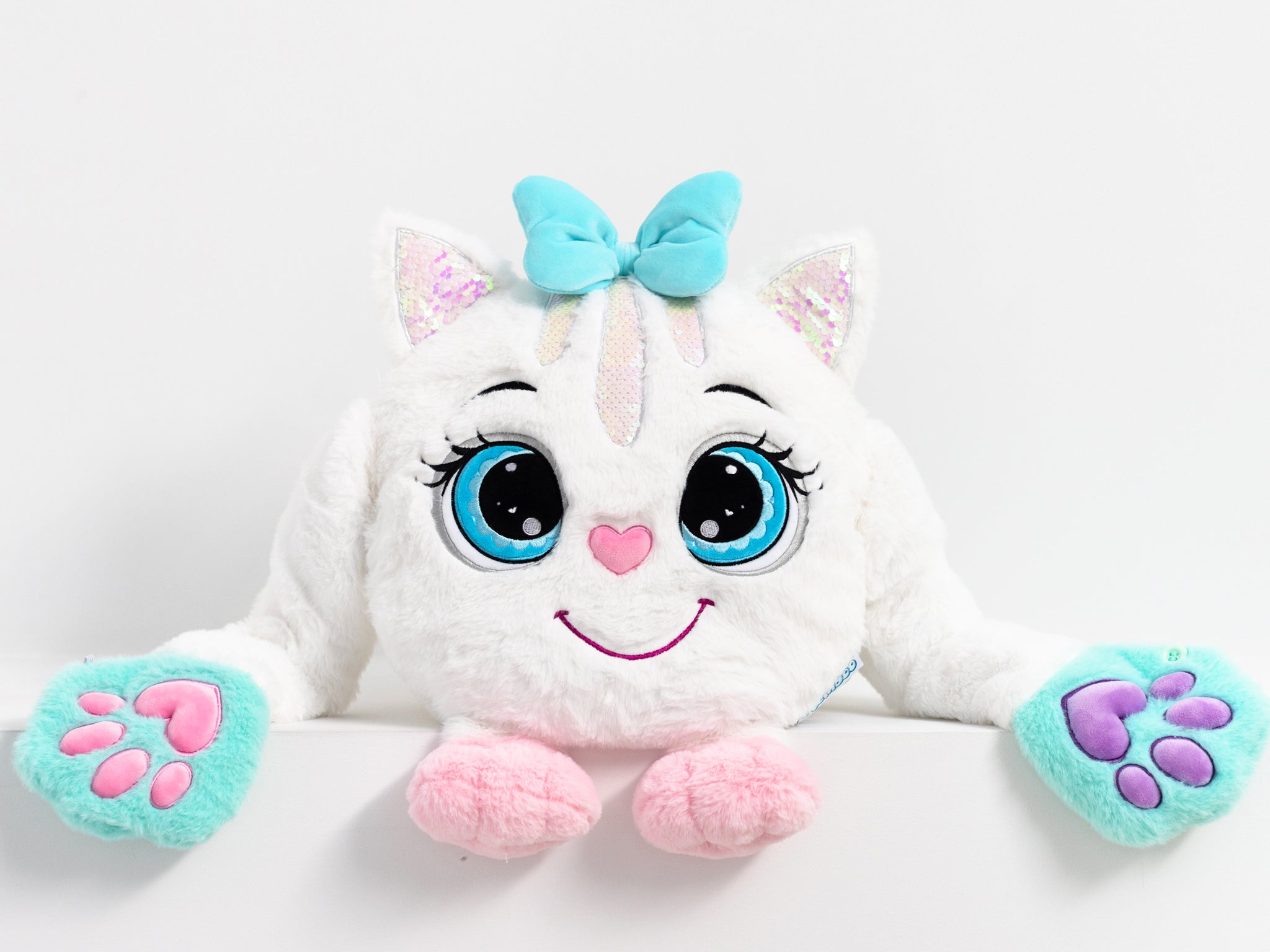 Adorable weigted plush toy cat with white fur and , featuring large expressive eyes, 3D sensory , paws, and noseand ears. This ultra-soft, cuddly sensory plush provides comfort, relaxation, and stress relief, beautifully displayed on a light gray background.