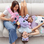 Mum and daughters relaxing on the couch while holding weighted colorful plush toys. These soft, cuddly sensory plush toys feature vibrant colors and adorable designs, making them perfect for comfort, relaxation, stress relief, and gifting.